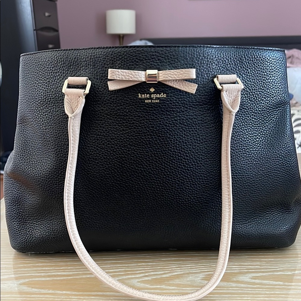 Black Kate Spade tote with pink bow
